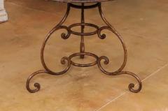 French 19th Century Round Iron Garden Table with Scrolling Base and Rusty Finish - 3555985