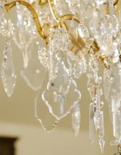 French Late 19th Century Crystal Chandelier with Brass Frame and Shaped Crystals - 3415055