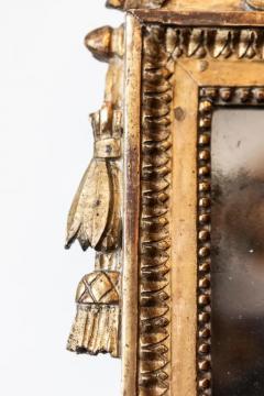 French Louis XVI Period 1790s Giltwood Mirror with Carved Bird and Flags - 3608502