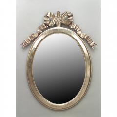 French Louis XVI style 20th Cent gilt oval vertical wall mirror with carved bo - 4700285