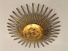 French Mid Century Modern Neoclassical Gilt Iron Sunburst Flush Mount or Pendant - 1759333