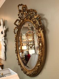 French Napoleon III Giltwood and Composite Oval Mirror with Ribbon Crest - 1896245