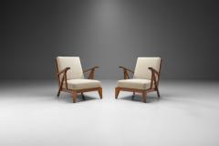 French Reconstructivist Oak Lounge Chairs France 1950s - 2228610