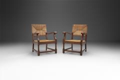 French Sculpted Oak and Paper Cord Armchairs France 1970s - 3128881