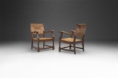 French Sculpted Oak and Paper Cord Armchairs France 1970s - 3128882