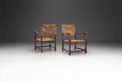 French Sculpted Oak and Paper Cord Armchairs France 1970s - 3128883