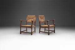 French Sculpted Oak and Paper Cord Armchairs France 1970s - 3128884