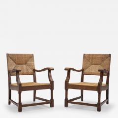 French Sculpted Oak and Paper Cord Armchairs France 1970s - 3132534