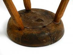 French three legged Mid Century solid wood stool with a dreamlike patina - 2525175