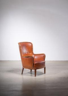 Frits Henningsen Frits Henningsen magoany and leather wingback easy chair - 1924497