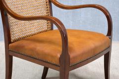 Frits Henningsen Pair of Frits Henningsen Armchairs in Mahogany Cane and Leather Denmark 1931 - 4450789