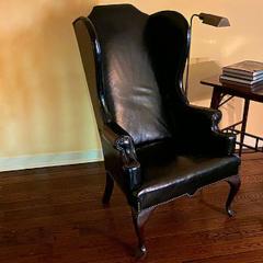 GEORGE II STYLE MAHOGANY AND BLACK LEATHER UPHOLSTERED WING CHAIR - 2011602