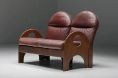 Gae Aulenti Love Seat Arcata by Gae Aulenti Walnut and Burgundy Leather 1968 - 3405739
