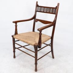 George Bell George Freeth Roper Aesthetic Movement Walnut rush seat armchair  - 4236831