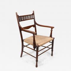 George Bell George Freeth Roper Aesthetic Movement Walnut rush seat armchair  - 4237638