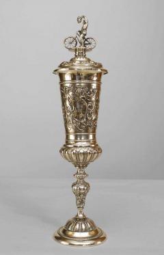 German silver plate chalice with floral relief and bicycle rider finial on lid - 4216365