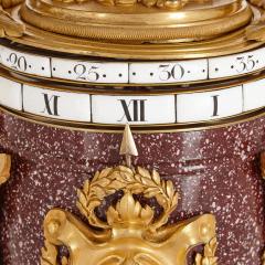 Gilt bronze mounted porphyry revolving dial mantel clock - 1641649