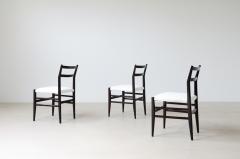 Gio Ponti Rare set of 12 chairs in anthracite stained wood with fabric covering  - 3732315