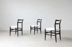 Gio Ponti Rare set of 12 chairs in anthracite stained wood with fabric covering  - 3732316