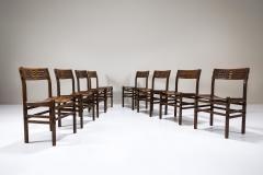 Giuseppe Rivadossi Set of Eight Rivadossi Dining Chairs with Carved Backrests in Slavonian Oak - 4023310