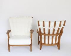 Guillerme et Chambron PAIR OF FRENCH GUILLERME ET CHAMBRON BLONDE OAK PETITE REPOS LOUNGE CHAIRS - 3357175