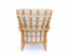 Guillerme et Chambron Pair of French Guillerme et Chambron blonde Oak petite Repos Lounge Chairs - 4264905
