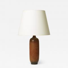 Gunnar Nylund Table lamp in burnt orange by Gunnar Nylund - 1042135