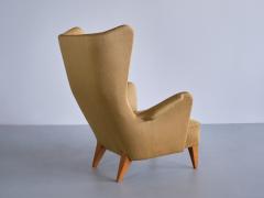 Gustav Axel Berg Gustav Axel Berg Attributed Wingback Chair in Yellow Wool and Elm Sweden 1940s - 3318530