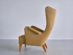 Gustav Axel Berg Gustav Axel Berg Attributed Wingback Chair in Yellow Wool and Elm Sweden 1940s - 3318533