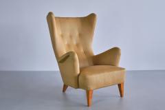 Gustav Axel Berg Gustav Axel Berg Attributed Wingback Chair in Yellow Wool and Elm Sweden 1940s - 3318534