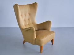 Gustav Axel Berg Gustav Axel Berg Attributed Wingback Chair in Yellow Wool and Elm Sweden 1940s - 3318536