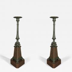 HAREWOOD HOUSE TORCH RES PAIR OF CARVED FAUX BRONZE AND FAUX PORPHYRY TORCH RES - 3917422