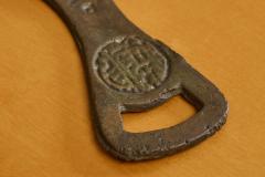 Hand Shaped Bottle Opener in Patinated Sand Cast Iron 1960s - 4526885