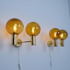 Hans Agne Jakobsson Pair of Hans Agne Jakobsson Brass Scones Model V 149 2 Amber Glass 1950s - 4722266