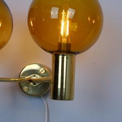 Hans Agne Jakobsson Pair of Hans Agne Jakobsson Brass Scones Model V 149 2 Amber Glass 1950s - 4722269