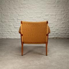 Hans Wegner CH25 Lounge Chair in Oak by Hans Wegner Denmark 1950s - 3112431