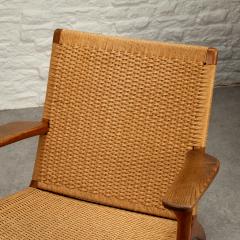 Hans Wegner CH25 Lounge Chair in Oak by Hans Wegner Denmark 1950s - 3112435