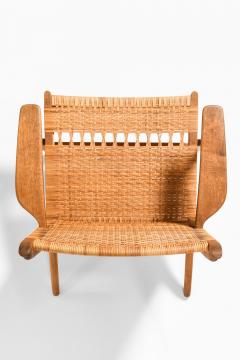 Hans Wegner Easy Chair in Cane and Oak by Hans Wegner 1949 - 4507645
