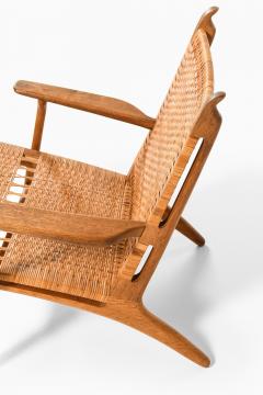 Hans Wegner Easy Chair in Cane and Oak by Hans Wegner 1949 - 4507646