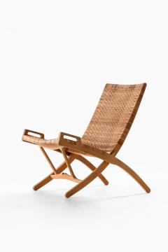 Hans Wegner Folding Easy Chair in Cane and Oak by Hans Wegner 1949 - 4555521