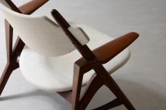 Hans Wegner Pair of CH 28 Sawbuck armchairs with teak wood frame and fabric upholstery - 3891555