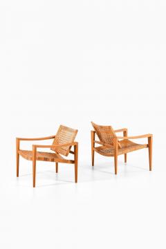 Hans Wegner Pair of Easy Chairs in Oak Woven Cane Brass and Leather by Hans Wegner 1959 - 4369836