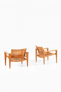 Hans Wegner Pair of Easy Chairs in Oak Woven Cane Brass and Leather by Hans Wegner 1959 - 4369837