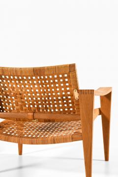 Hans Wegner Pair of Easy Chairs in Oak Woven Cane Brass and Leather by Hans Wegner 1959 - 4369842