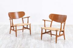 Hans Wegner Pair of Hans J Wegner CH 22 Lounge Chairs for Carl Hansen S n - 2227955