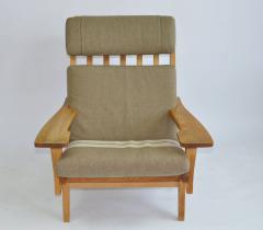 Hans Wegner Pair of Wide Arm Lounge Chairs by Hans Wegner - 352096