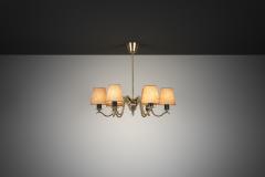 Harald Notini Six Armed Brass Chandelier by Harald Notini Attr for B hlmarks Sweden 1940s - 4710905