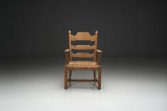Henning Kjaernulf Armchair with Woven Seating in the manner of Henning Kj rnulf Denmark 1960s - 4556552