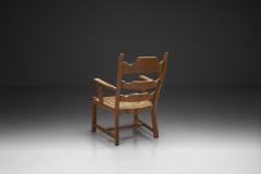 Henning Kjaernulf Armchair with Woven Seating in the manner of Henning Kj rnulf Denmark 1960s - 4556554