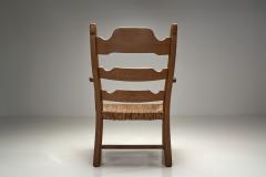 Henning Kjaernulf Armchair with Woven Seating in the manner of Henning Kj rnulf Denmark 1960s - 4556555